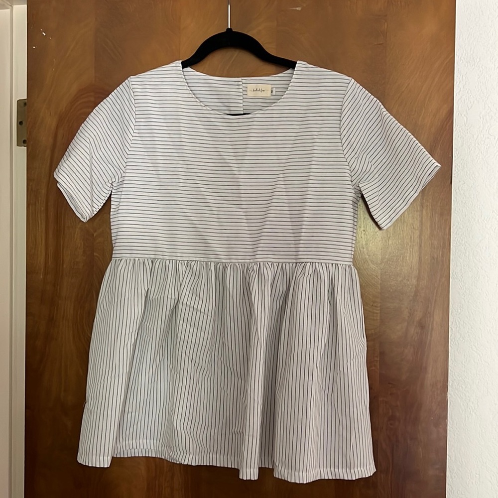 Knotted fern peplum top